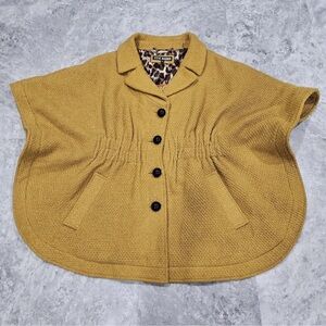 Steve Madden Golden Cape with Black Accents